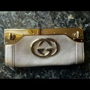 Gucci Gold Leather Clutch
